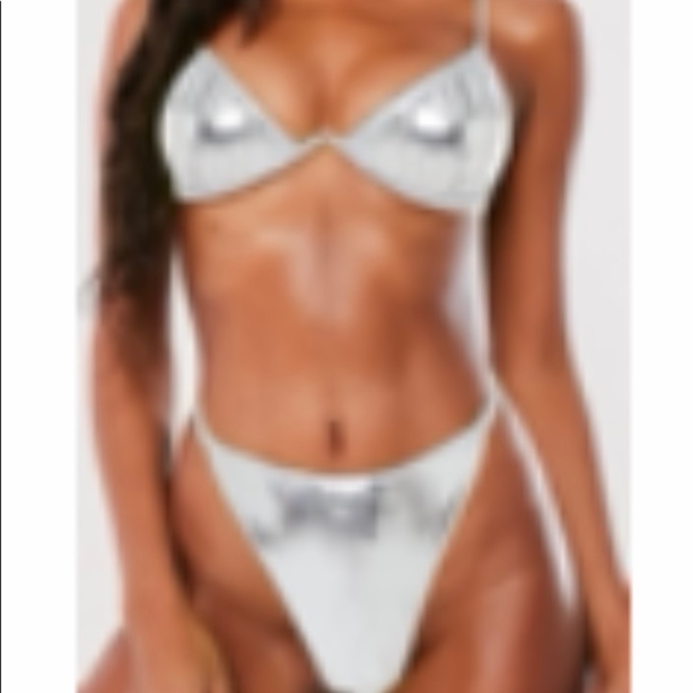 missguided 2 piece silver swimwear. pictures show from and back of item size 4